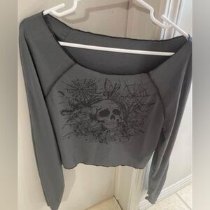 Long sleeve off shoulder skull shirt